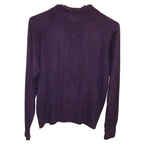 Long sleeve high collared woman’s tee. Textured